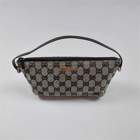 pochette gucci monogram prezzo|GUCCI Monogram Boat Pochette Black 1514263 .